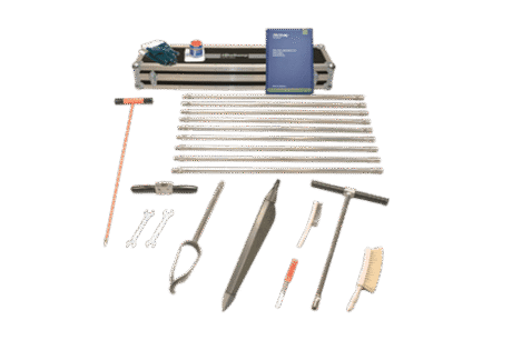 The Peat Sampler Set is shown on a white background, featuring metal rods, T-handles, spanners, brushes, a core sampler, carrying case, manual, and small container arranged neatly.
