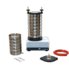 The Granular Composition Test Set for Wet and Dry Sieving features a laboratory sieve shaker with stacked metal sieves, extra sieves, spanners, a red hose, and a black component arranged on a white background.