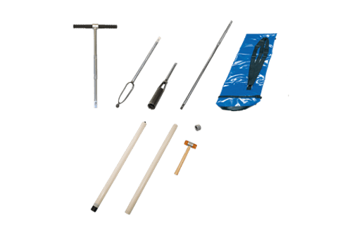 The Auger Set for HydraProbe Installation is displayed on a white background, showing metal rods, a T-shaped handle, a blue carrying case, and multiple cylindrical components.