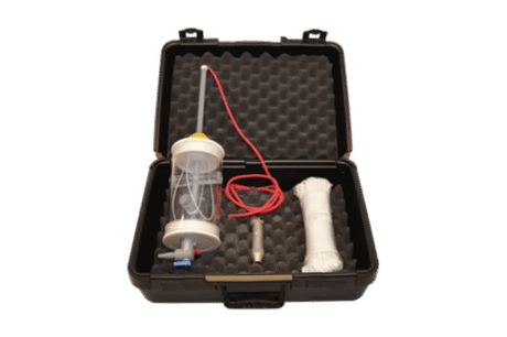 A black foam-lined case holds the Kemmerer Water Sampler Set, including a lantern with a red lead, a cylindrical sampler, and a wrapped white item, all neatly arranged inside.