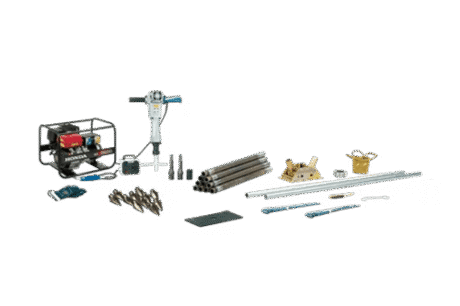 The Lost-Cone Drilling Set-Standard includes a generator, pneumatic drill, drill bits, metal pipes, rods, spanners, clamps, and accessories, all arranged neatly on a white background.